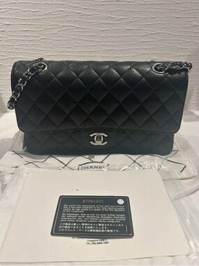 CHANEL Black Quilted Flap Shoulder Bag with Silver Hardware